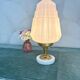Art Deco lamp with pastel pink opaline globe.