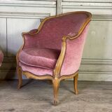 Pair of Louis XV style bergère armchairs in carved wood, pink velvet, circa 1900
