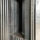 Strafor double-door corrugated iron cloakroom, circa 1920.