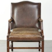 Wooden cow leather English Gainsborough chair with a stunning appearance