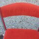 Pair of designer chairs in chrome metal and orange velvet from the 1970s.