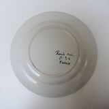 Old ceramic plate, hand-decorated, signed: bird on a fence.