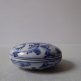 Porcelain pill box decorated with blue and white flowers