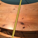 Vintage bar counter with natural wood stools