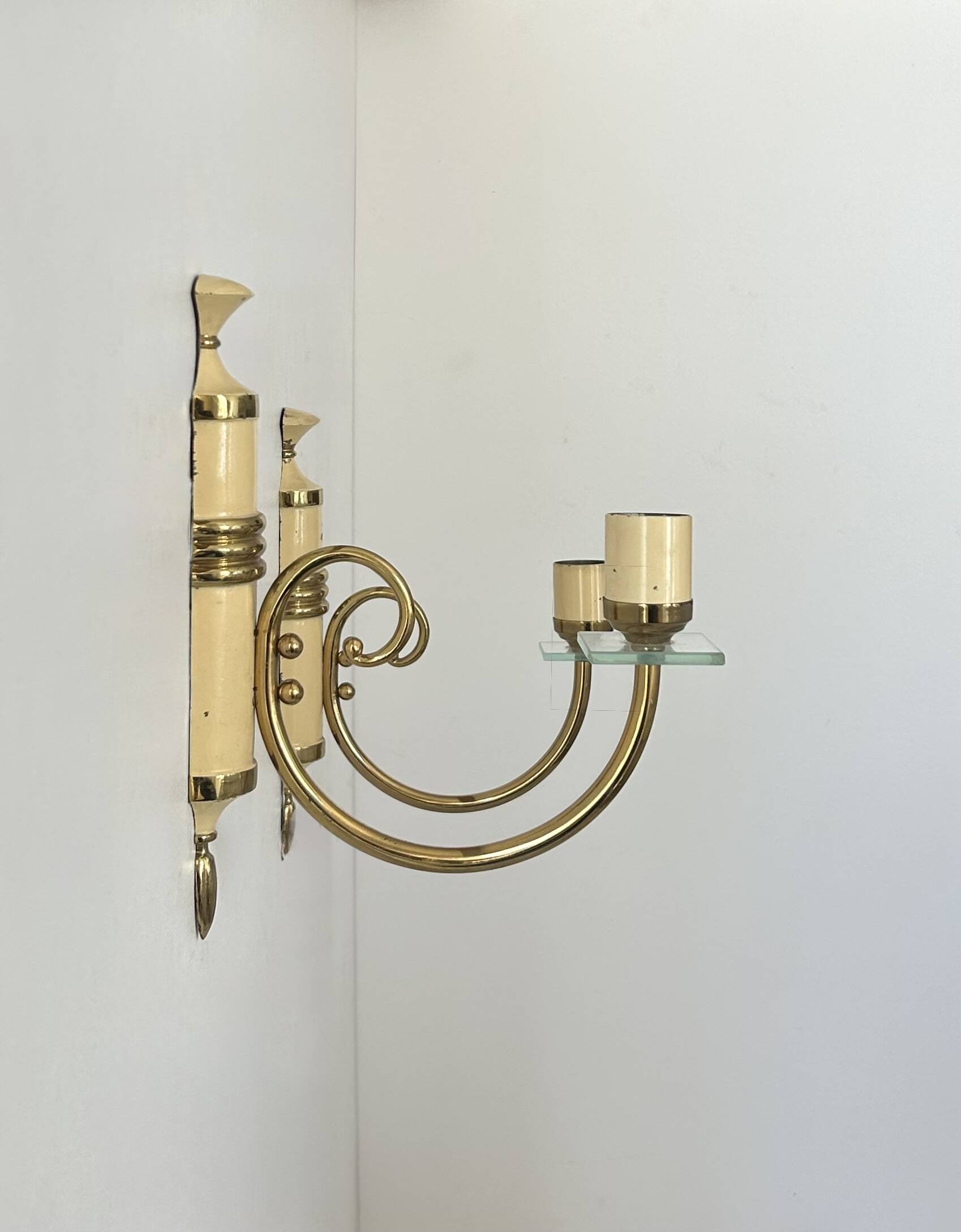 Pair of vintage patinated brass wall lights, France, 1940s