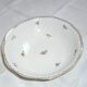 8 plates and a dish in porcelain decorated small flowers