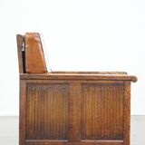 Fauteuil ancien en peau de mouton retapissée