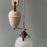 Old holophanous suspension goes up and down