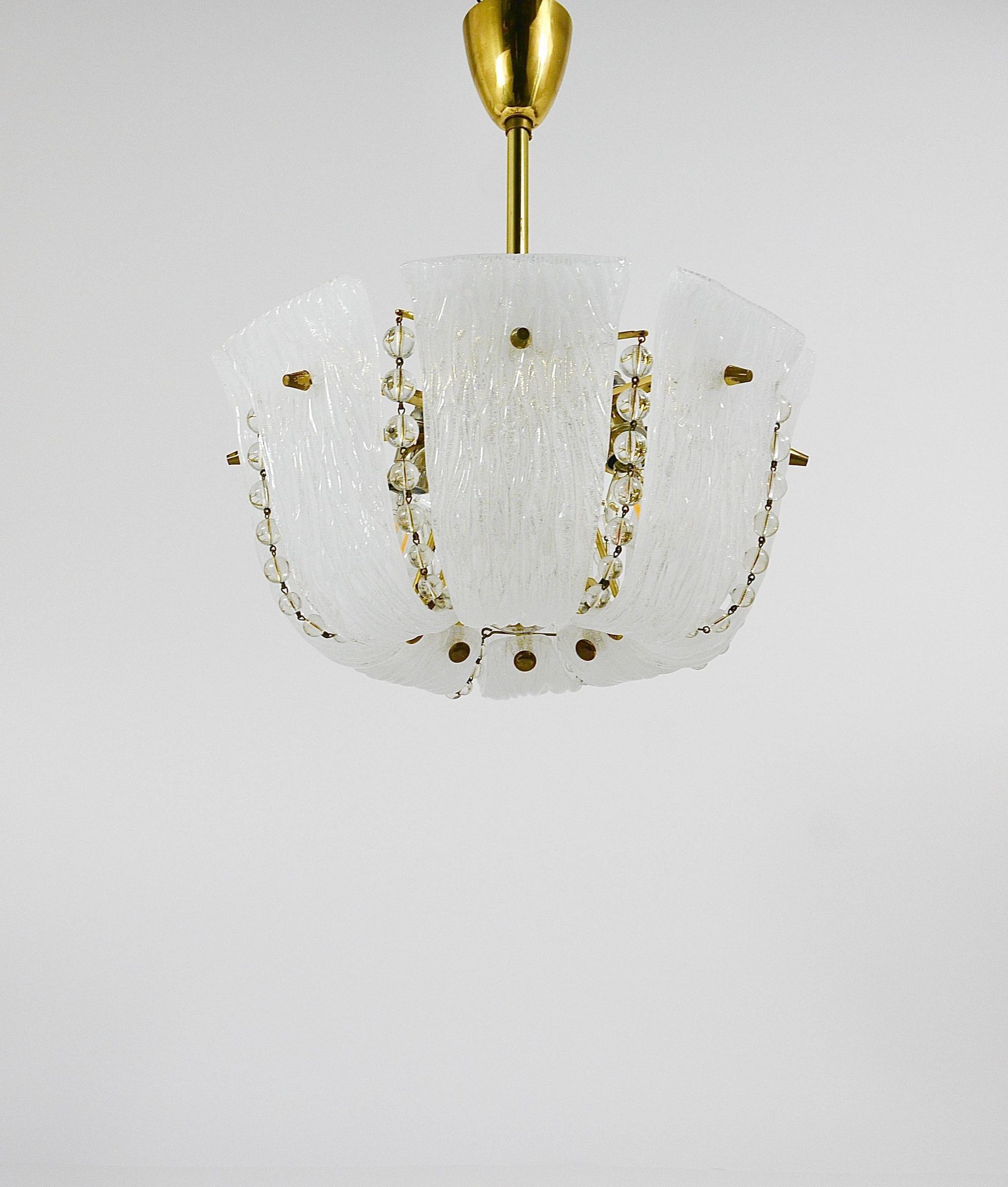 J.T. Kalmar Petite curved suspension basket, brass and glass, Austria, 1950s