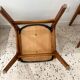 Chaise vintage scandinave en bois et simili cuir noir