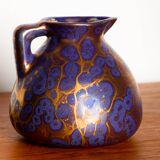 Art Nouveau vase in iridescent purple glazed ceramic by Léon Pointu 1910.