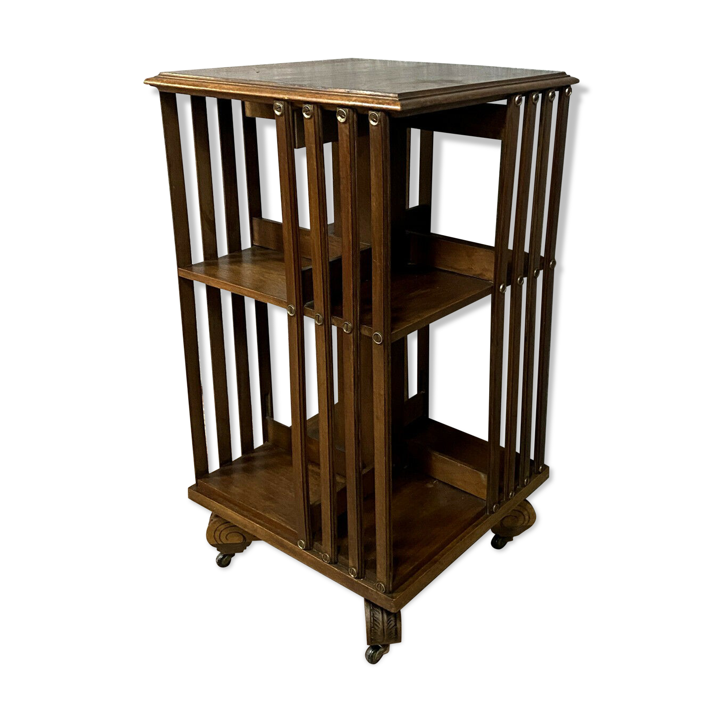 Revolving library with mahogany bars circa 1900