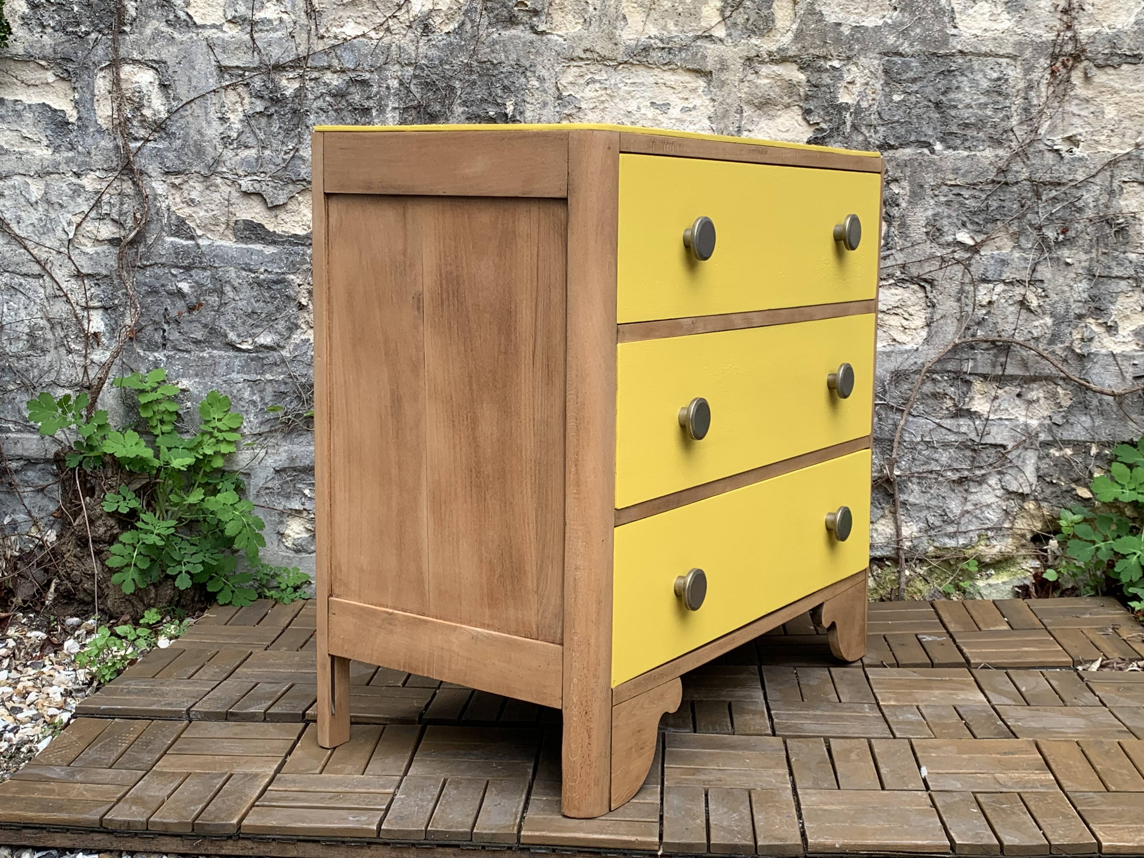 Commode art déco jaune poudré et bois brut