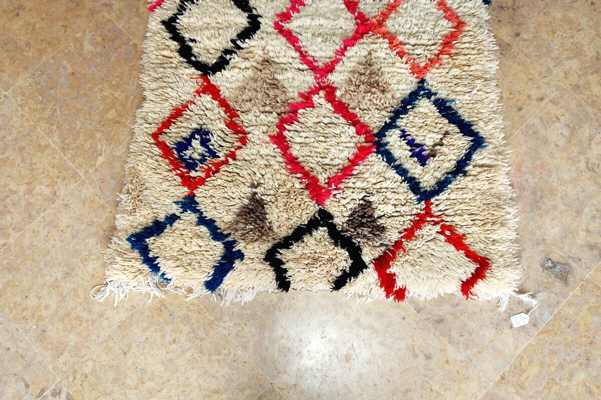 Small vintage beni ouarain rug