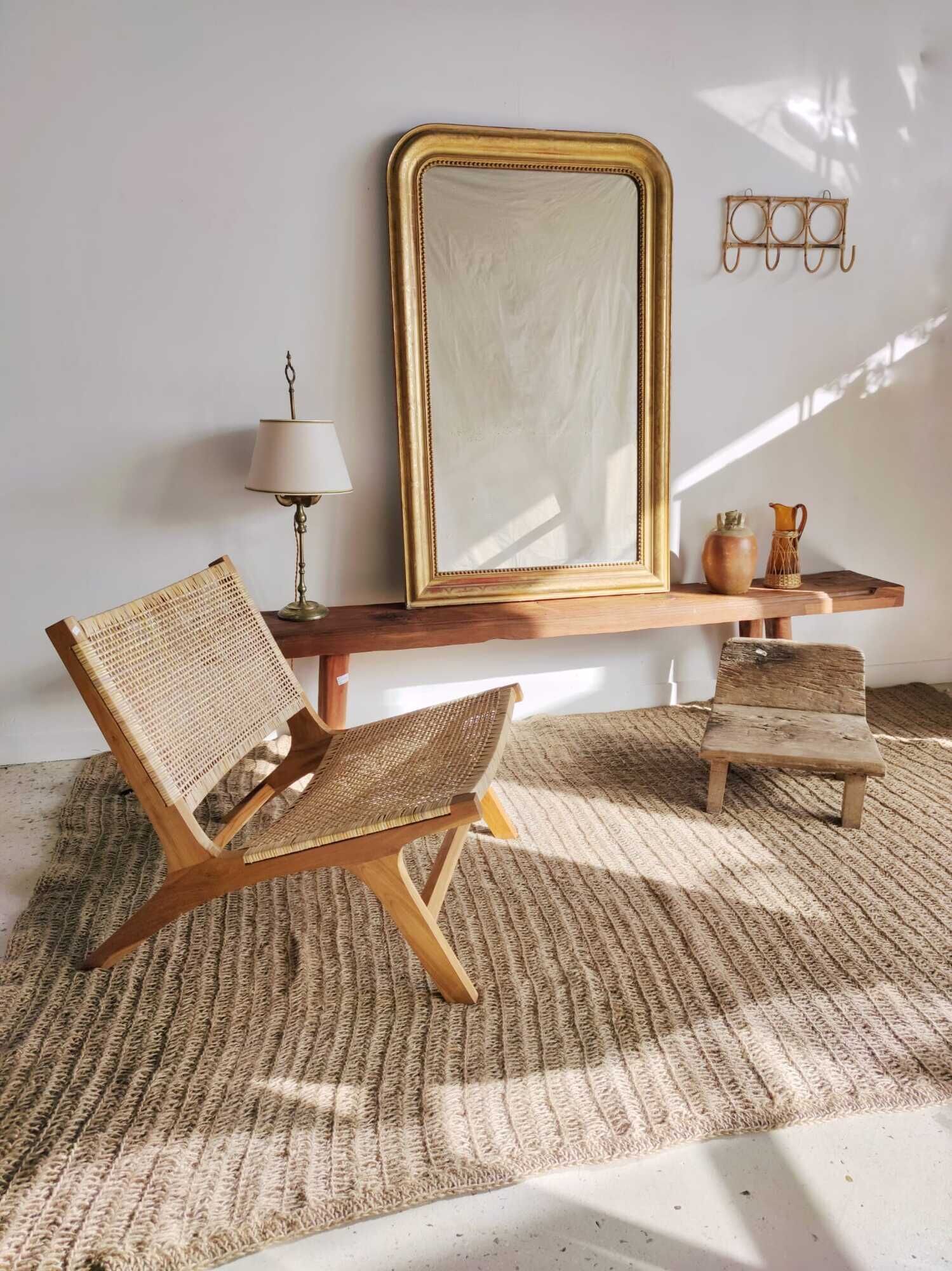 Reclining armchair in natural wood and woven rattan
