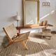 Reclining armchair in natural wood and woven rattan