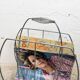 Vintage chrome magazine rack with ball feet