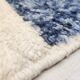 Moroccan Berber rug Boujaad ecru with colorful and mottled patterns 300x212cm