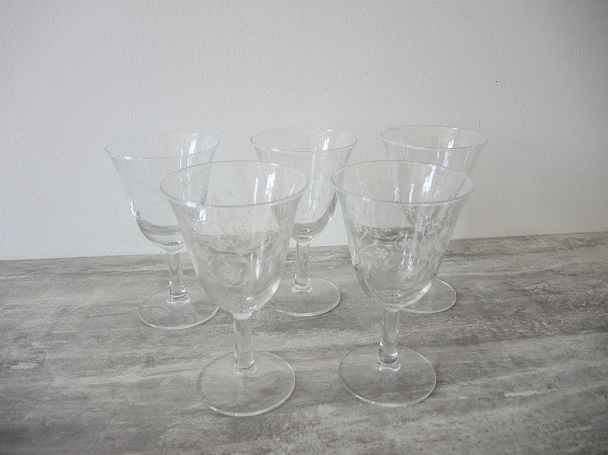 5 old transparent foot glasses – white floral pattern