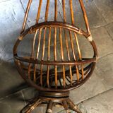 Swivel rattan armchair