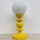 Mid-century design yellow table lamp with glass globe, 1970s