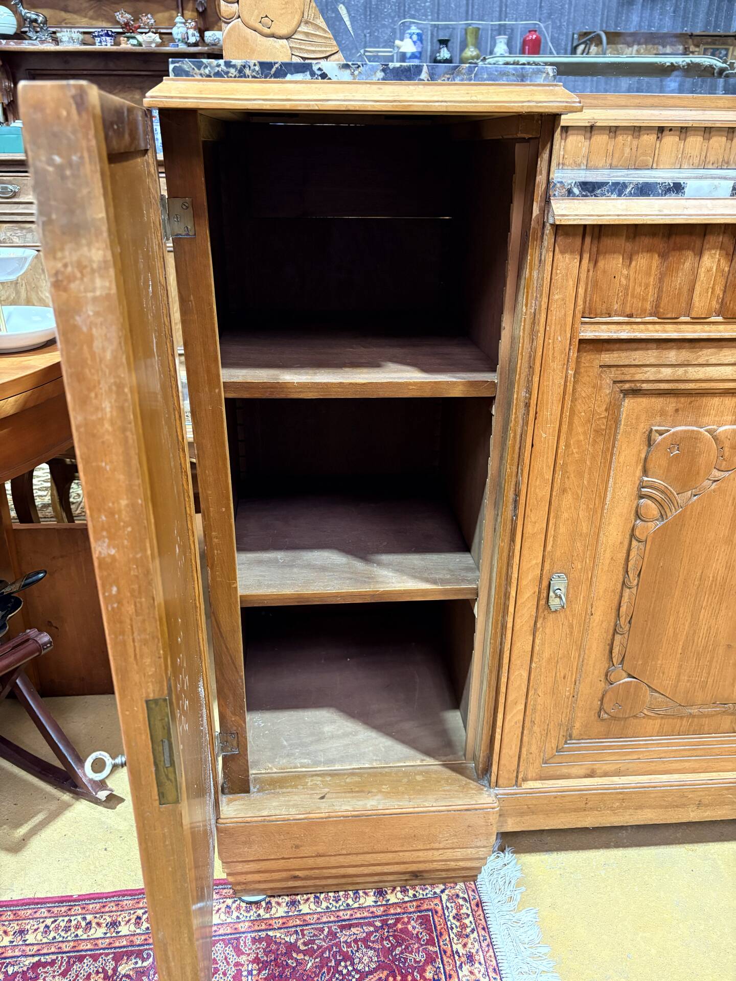 Art Deco buffet in carved walnut, marble and large mirror – 1930s