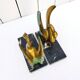 Pair of art deco golden swan bookends