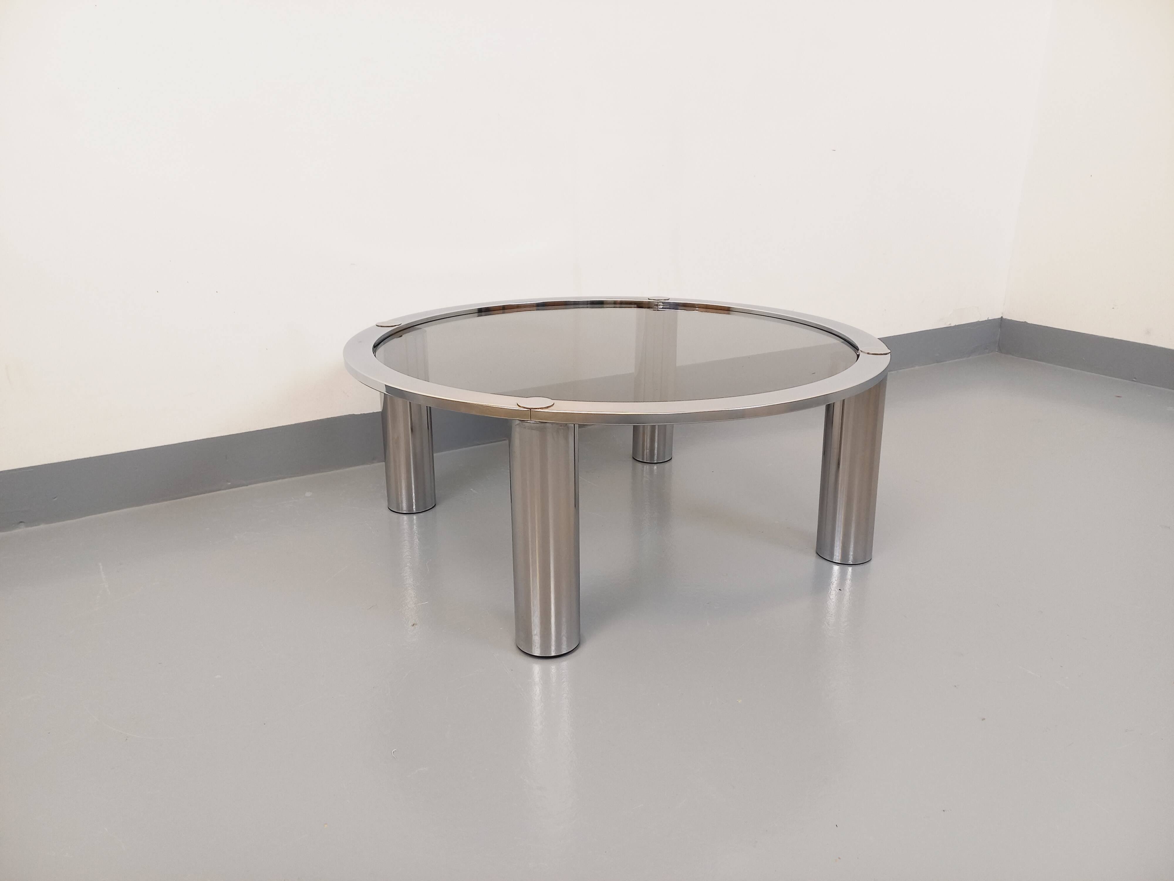 Vintage round coffee table in smoked glass and chrome metal from the 70s