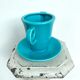 Milk jug on plate