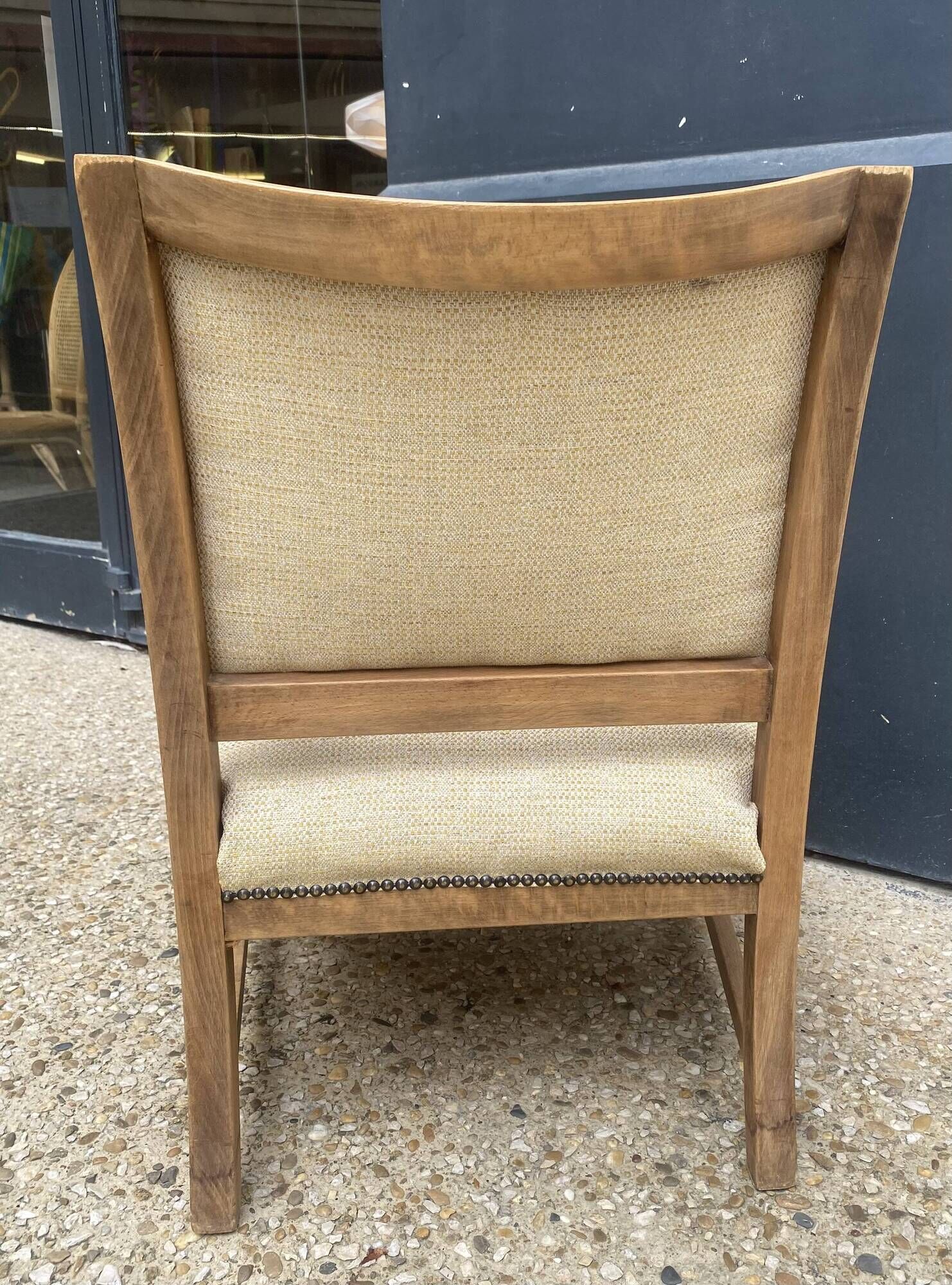 Pair of wooden and cream fabric armchairs