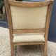 Pair of wooden and cream fabric armchairs