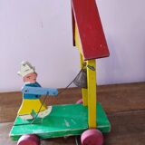 Ancien jouet à tirer en bois