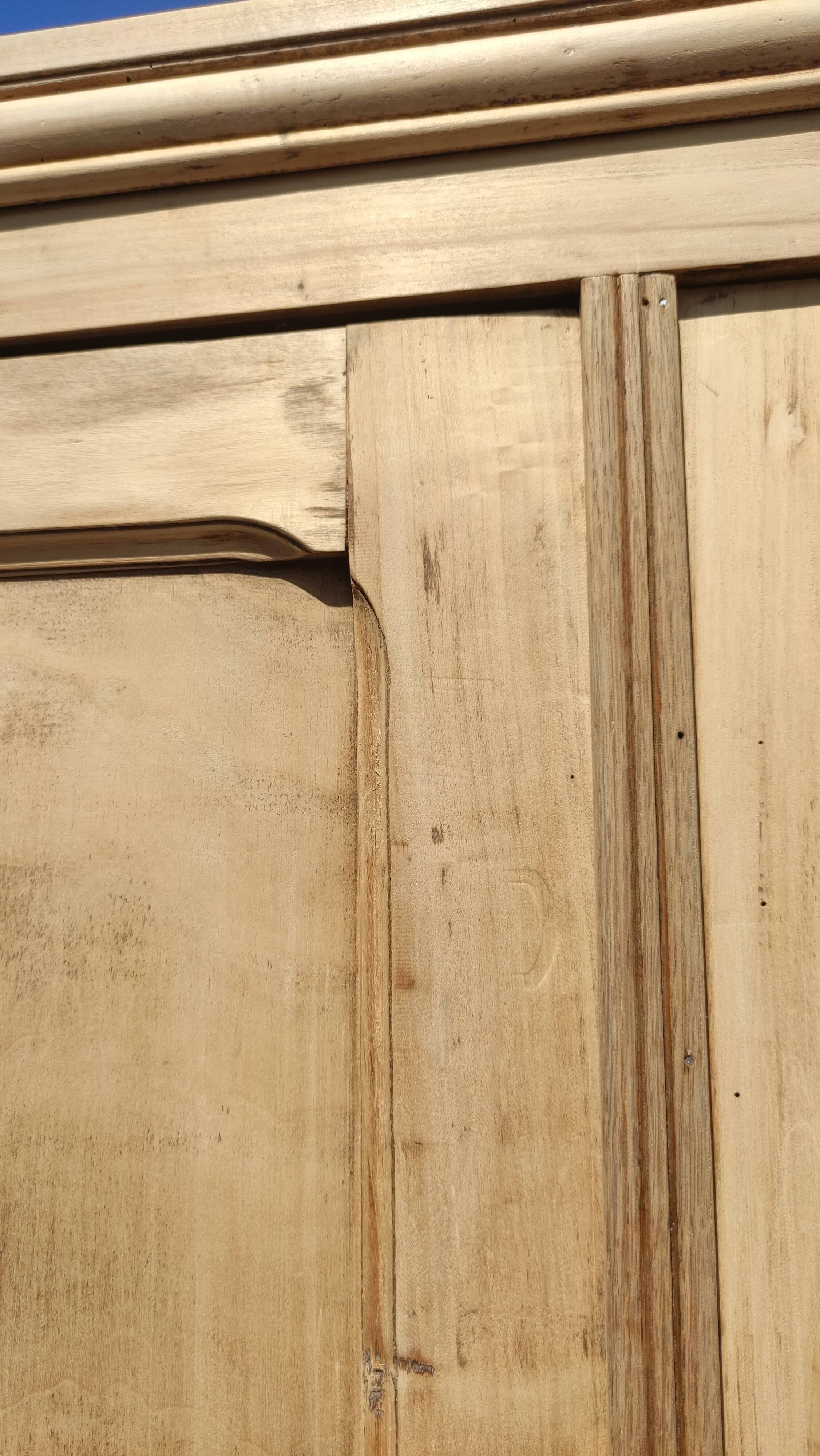 Parisian wardrobe in raw wood