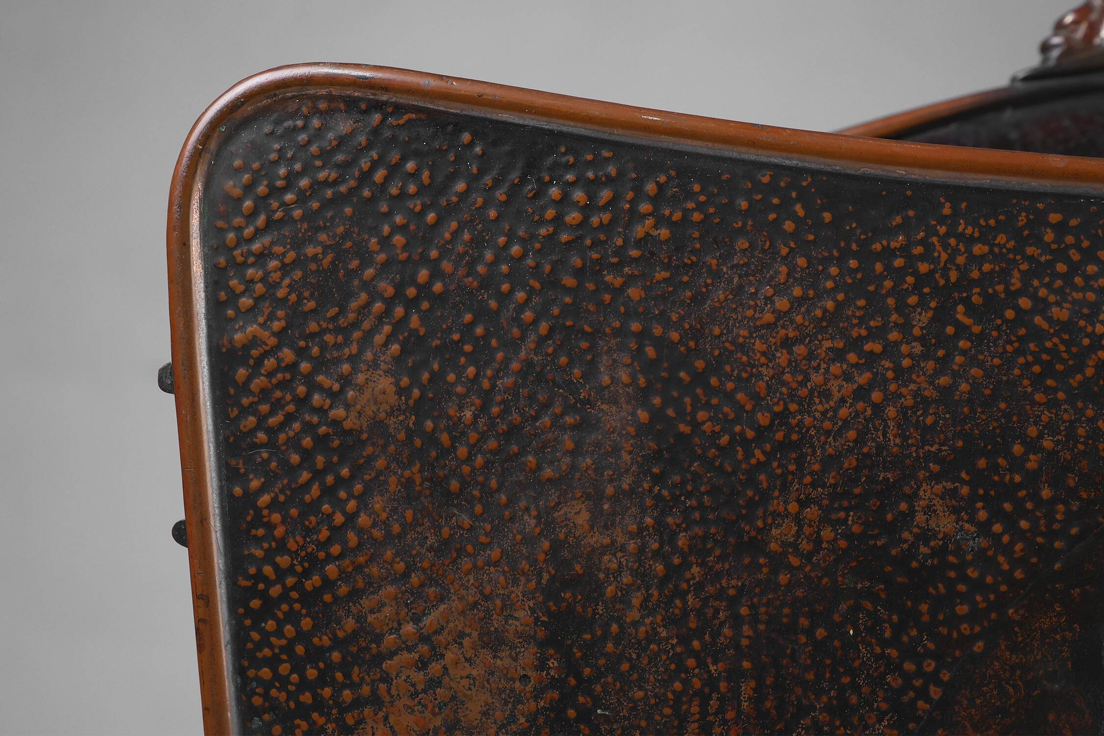 Mid-century magazine rack in hammered copper, France ca. 1900