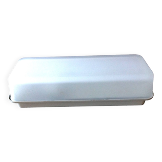 Rectangular porthole wall light in industrial/70s style frosted glass