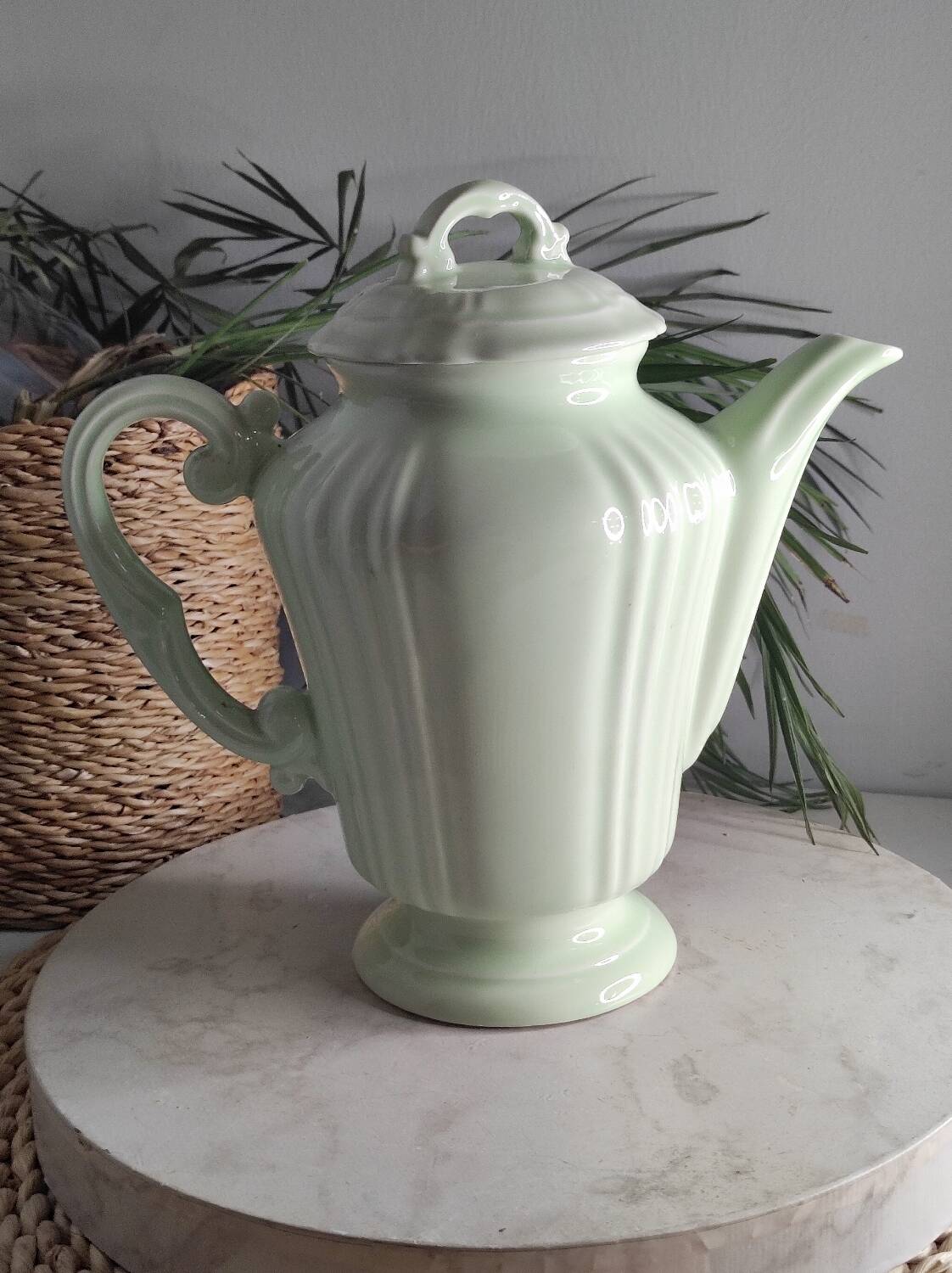 Green ceramic teapot