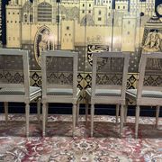 Suite de 4 chaises cannées style Louis XVI Jean Mocque