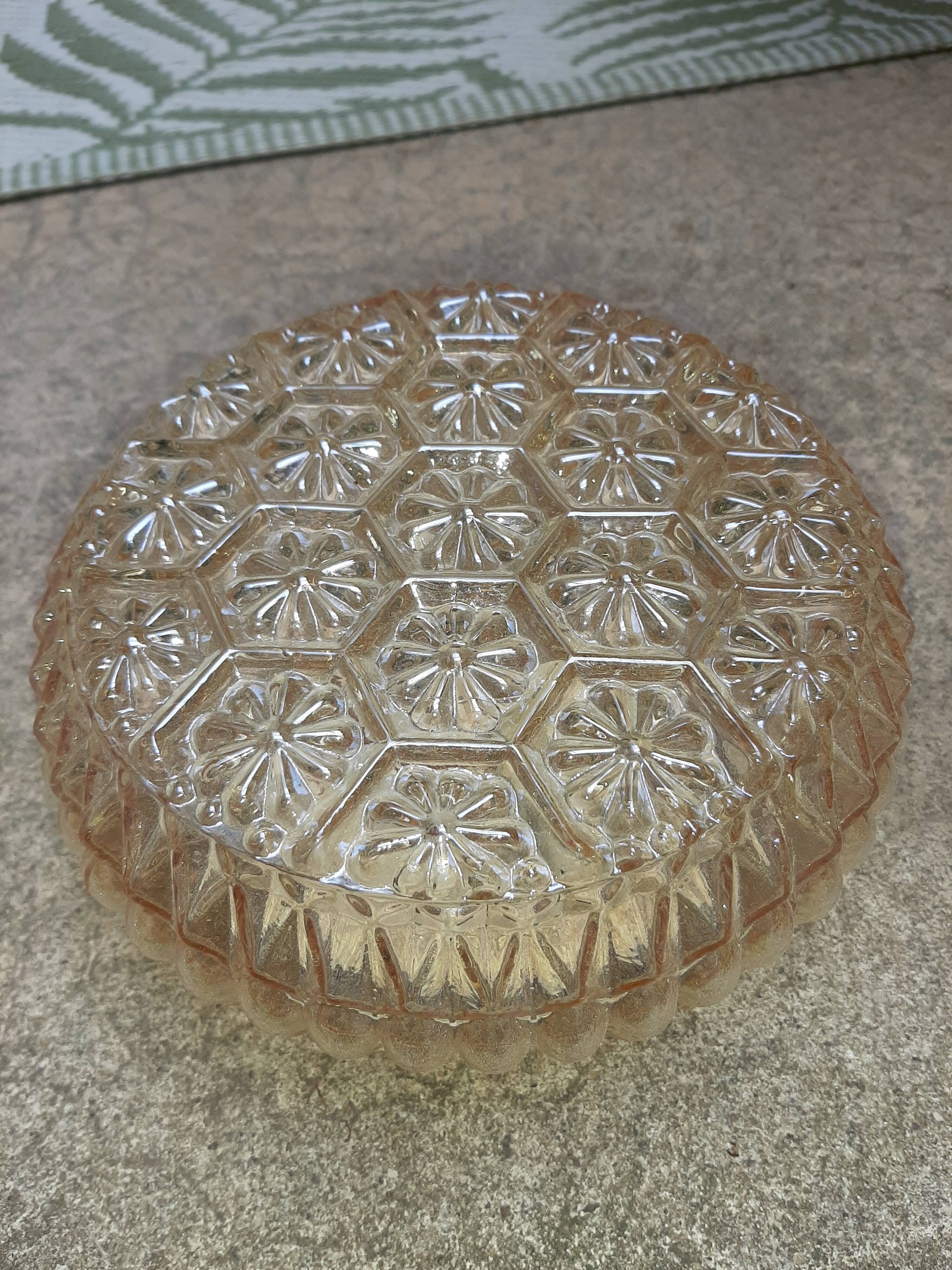 Moulded glass wall sconce