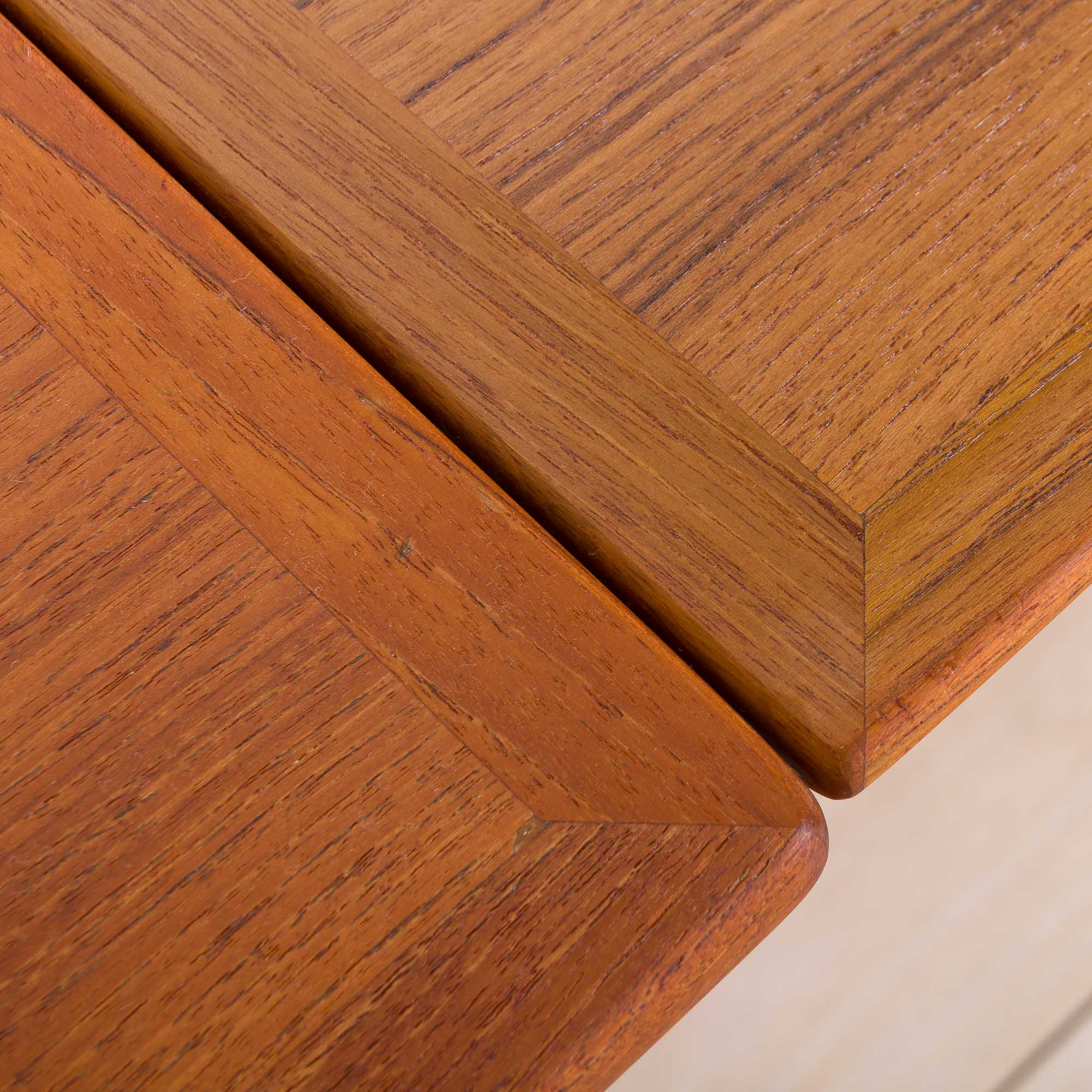 Teak extension dining table with concealed panels, Denmark, 60s
