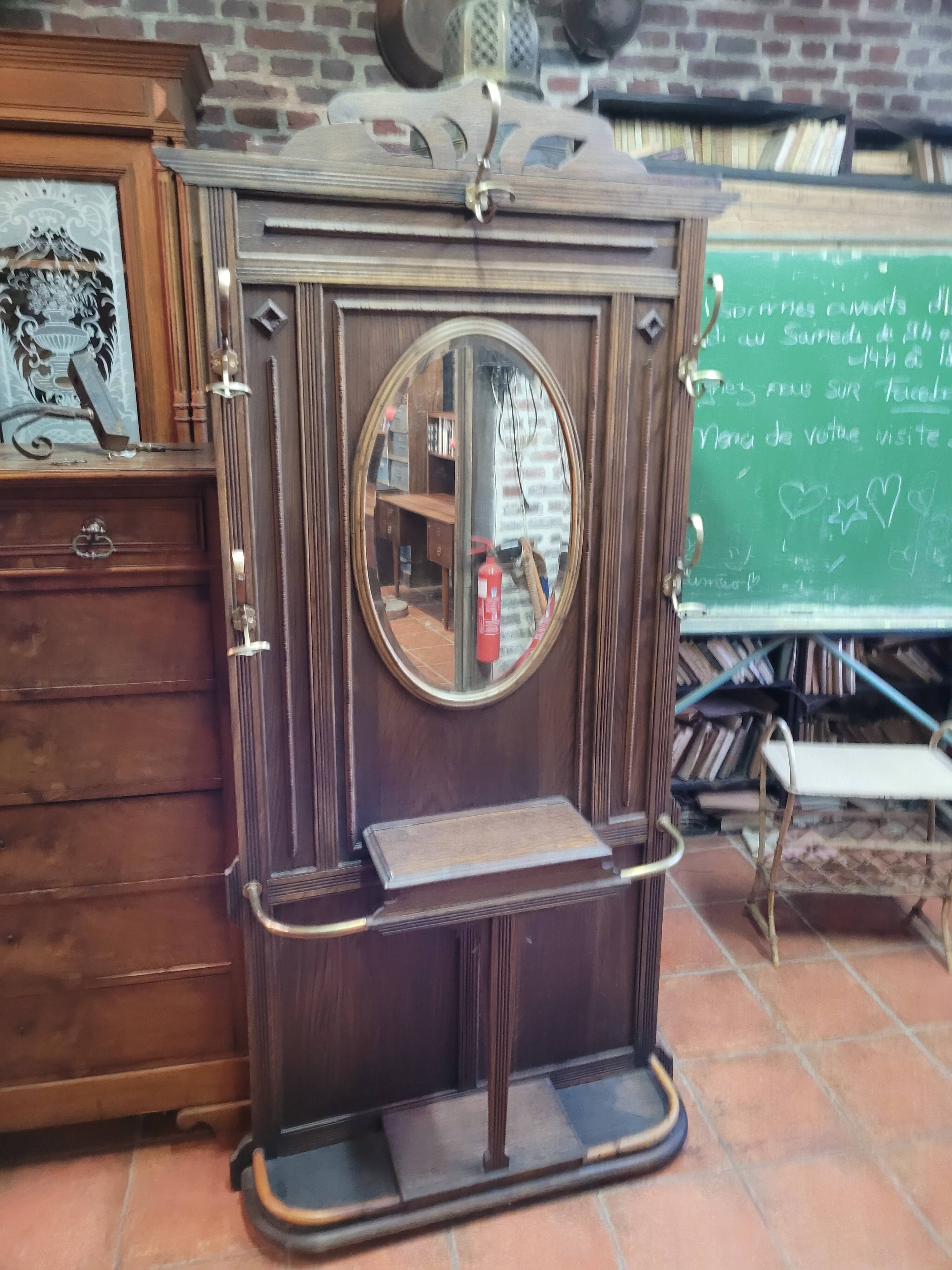 Old cloakroom or coat rack in oak