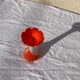 Orange and white opaline vase in the shape of a vintage flower corolla