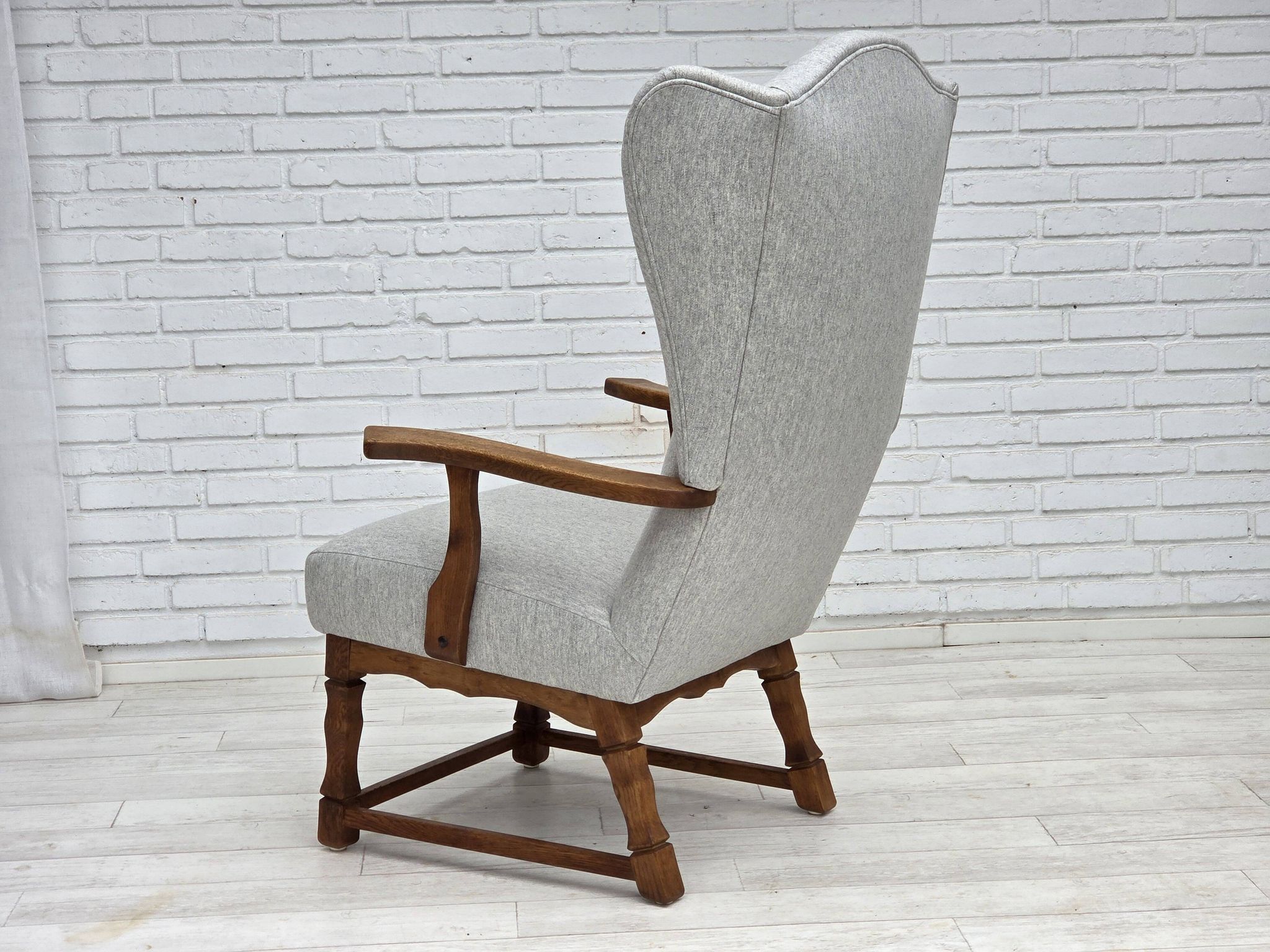 1950s, Danish high-backed armchair, reupholstered, wool, oak wood.