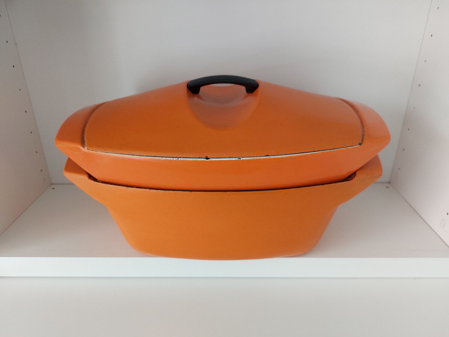 Double casserole in orange cast iron Le Creuset design Raymond Loewy