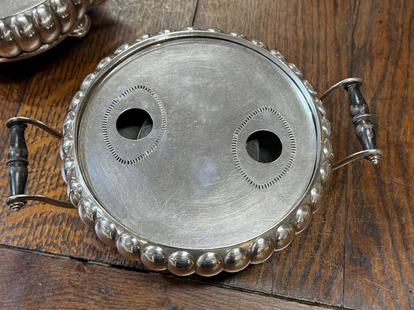 Pair of silver-plated hot plates from the 1950s.