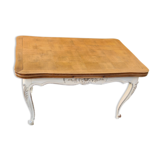 A stay table with patinated extensions