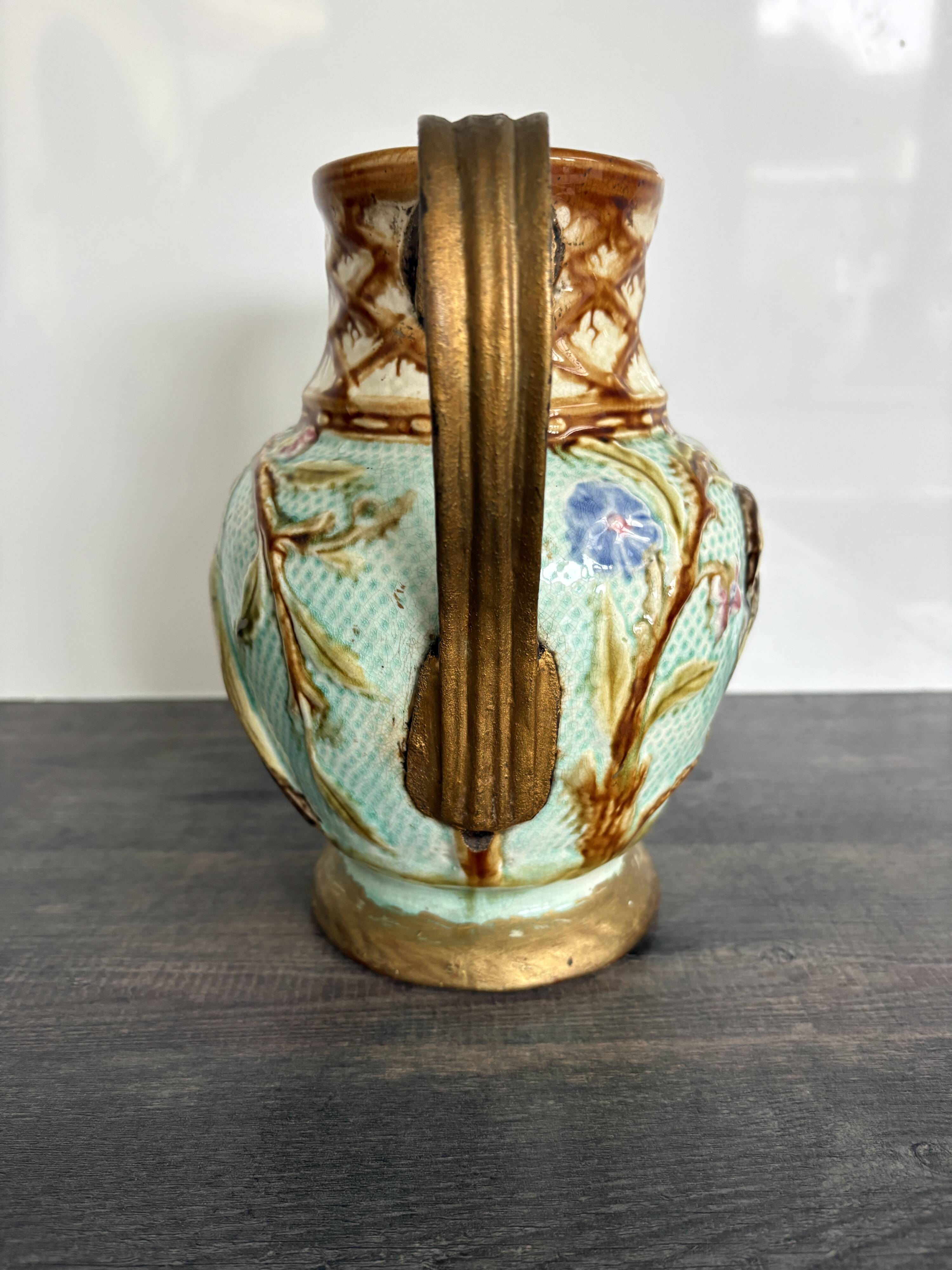 Pichet barbotine 19th century with bird decoration.