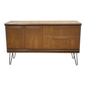English sideboard from the 70s in teak on black metal compass legs