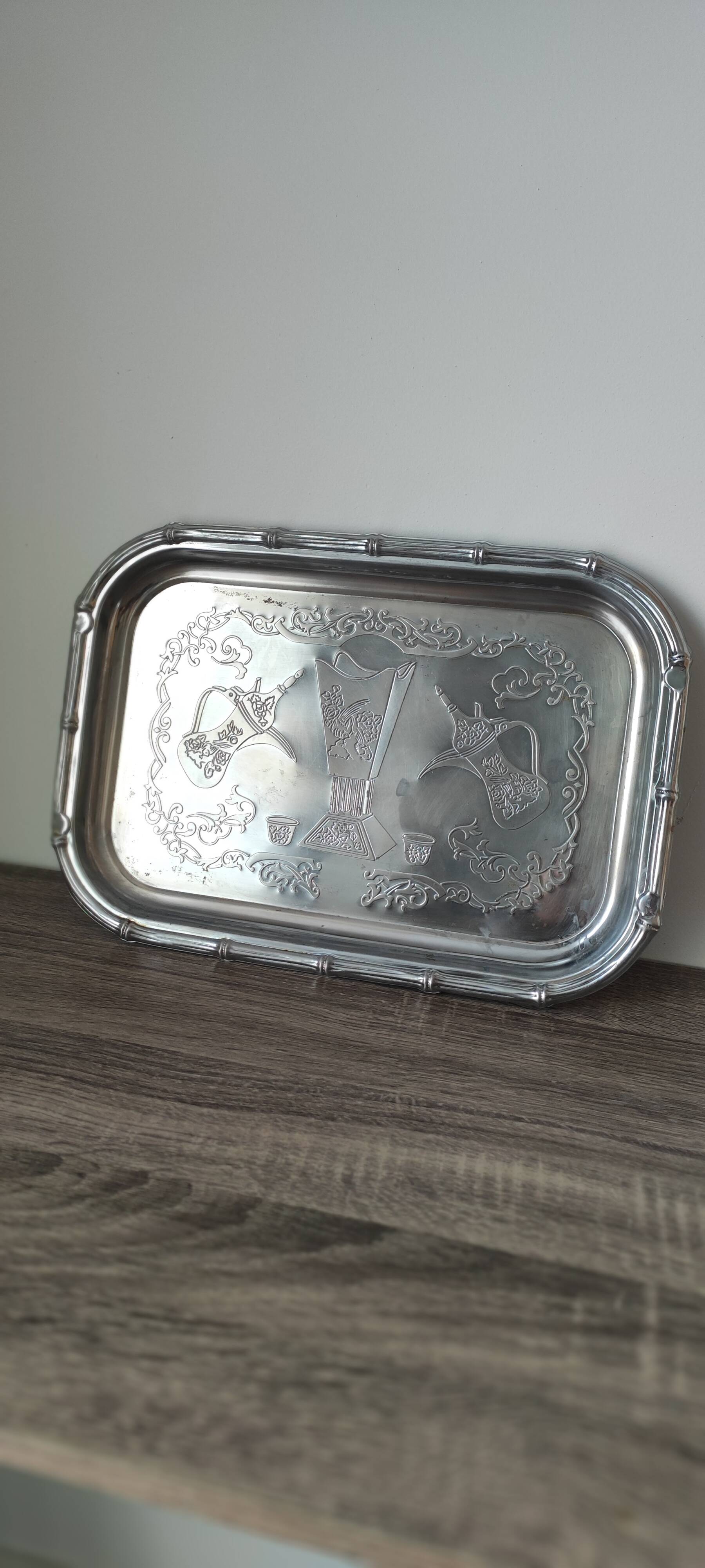 Rectangular silver-plated metal dish with an 80s-style design.