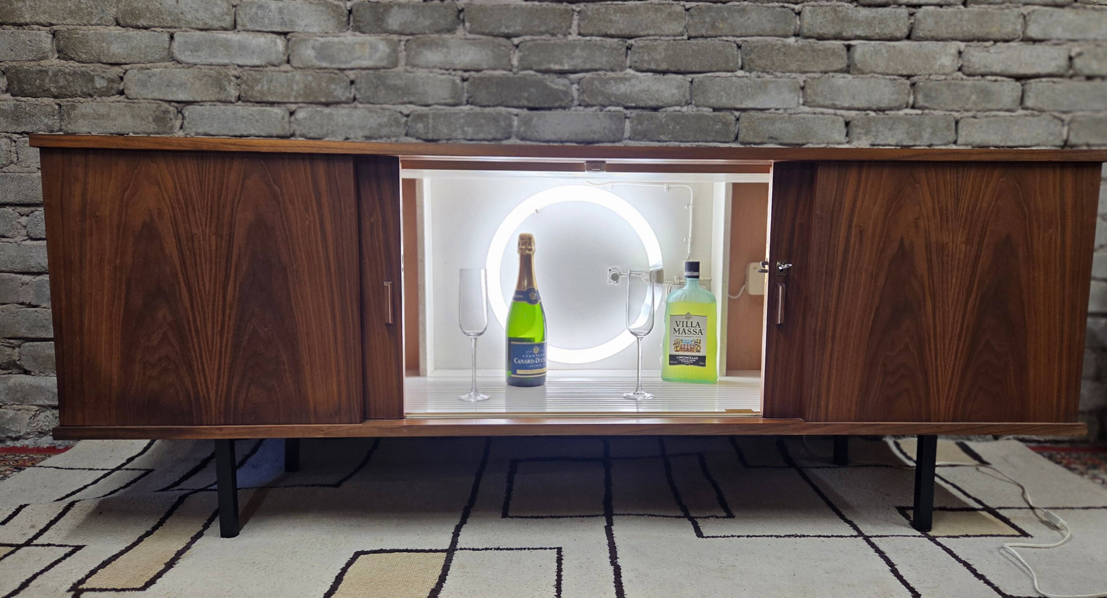 Vintage teak Scandinavian bar cabinet from the 1960s.