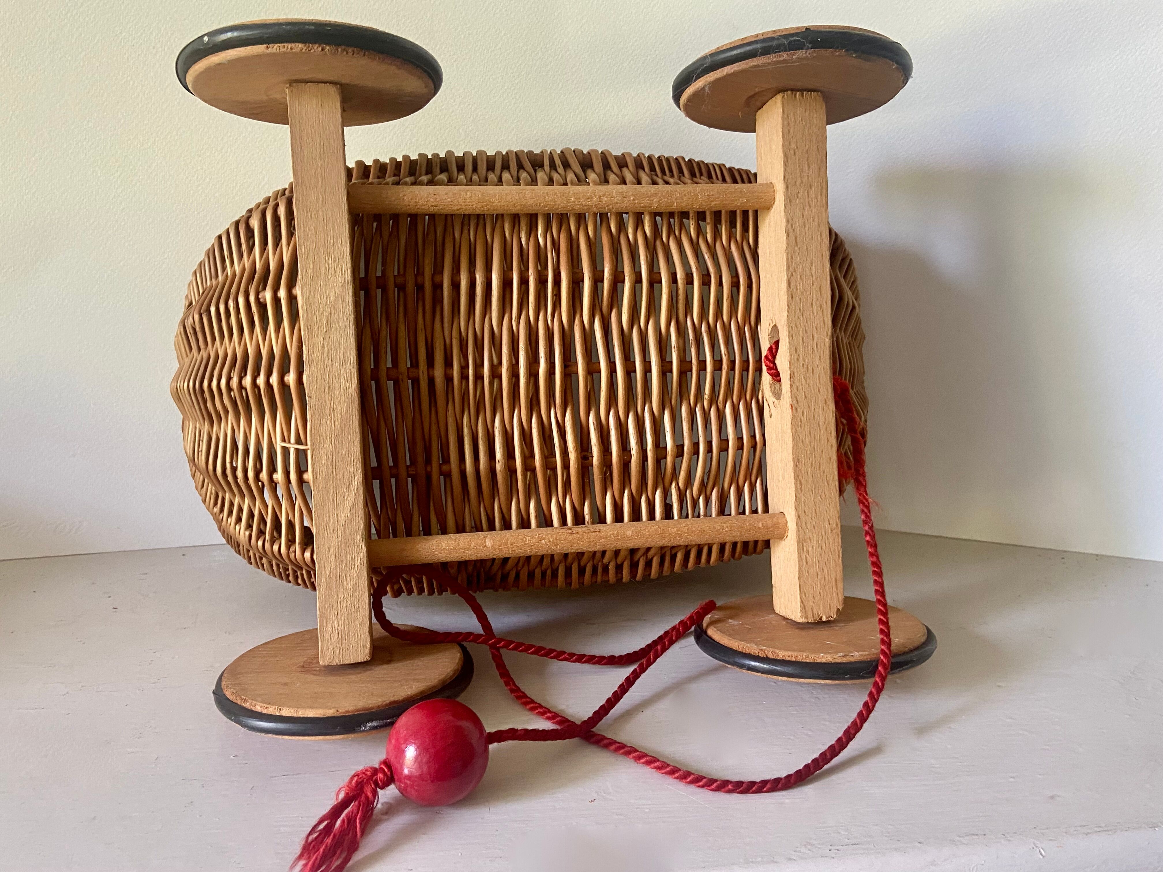 Braided wicker cradle, pulling toy